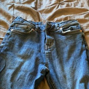 Dark washed blue jeans